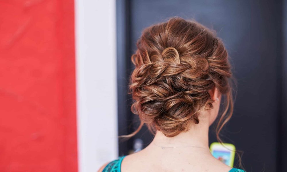 beautiful hairstyle woman turned back in studio.